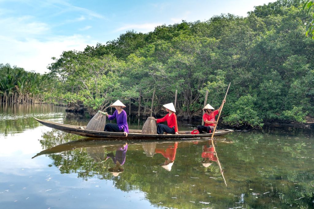 Women on a Wooden Boat
